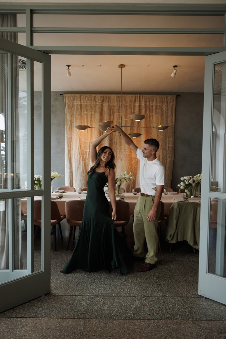 Isabella and David dancing at their engagement dinner